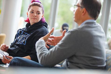 Student listening to a professor.